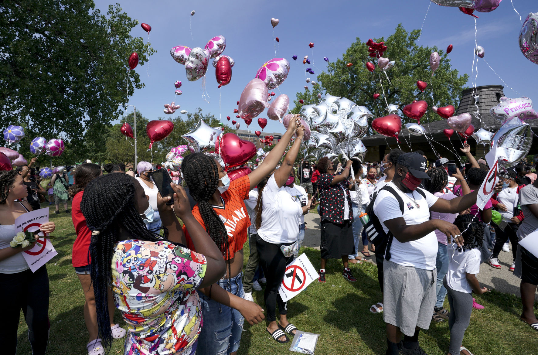 Mourners gather in park